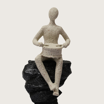 Drummer Figurine on Pillar